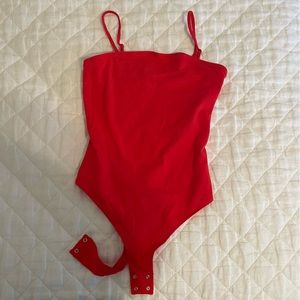 Red tube top bodysuit